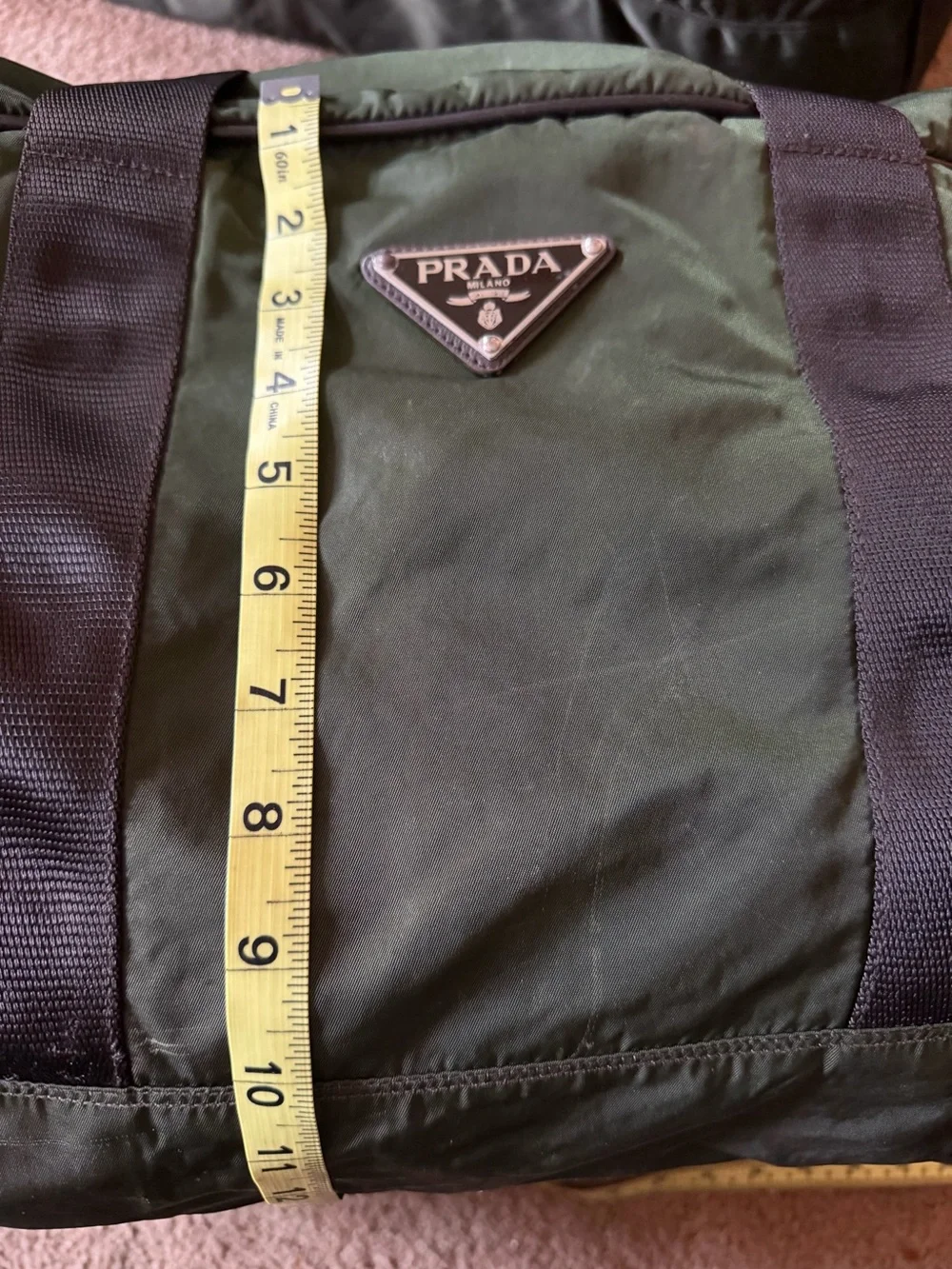 Prada Dark Olive Nylon Duffel Bag with Black Straps. Versatile Travel Piece!